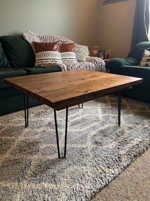 Reclaimed stained barnwood coffee table on black hairpin legs