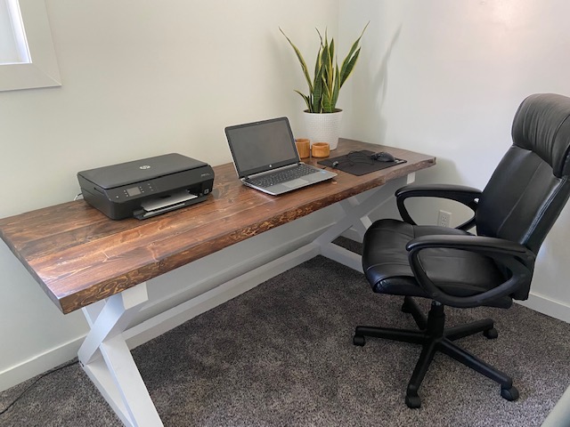 Beautiful wood desk with live edge stained top and white painted farmhouse style legs